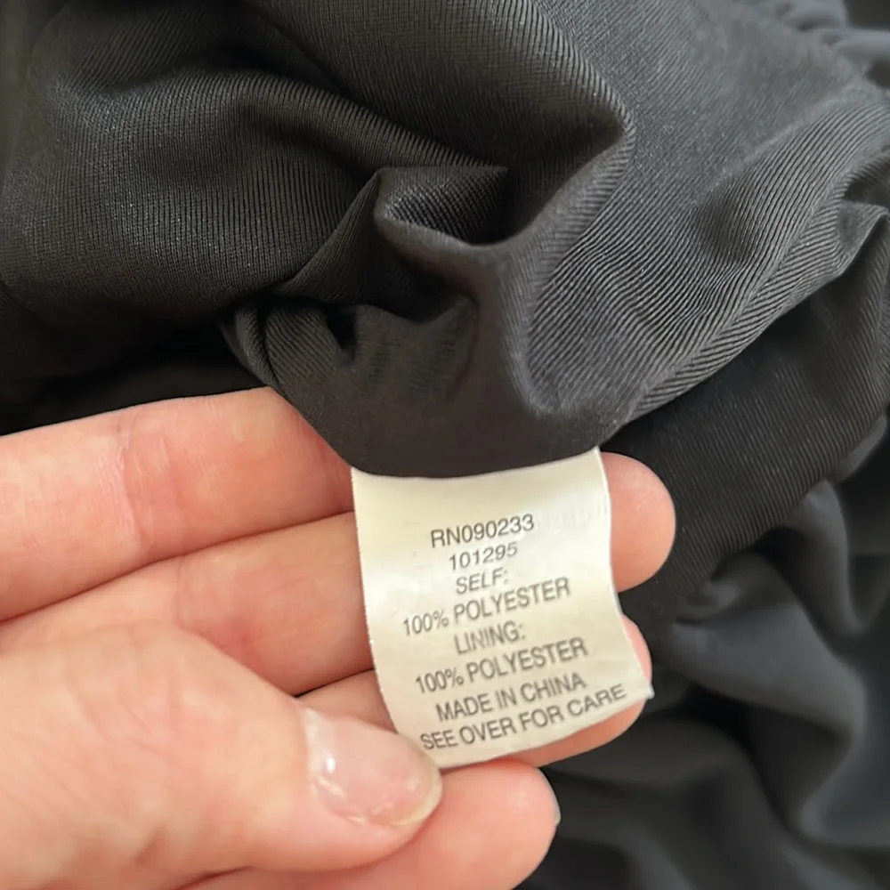 A black dress with cute ruffles and shape to the body - Picture 4 of 4